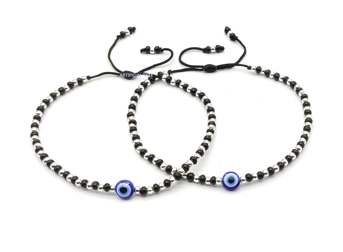 ARTIFICIAL JEWELS German Silver EVIL EYE Charms Black Thread Adjustable Nazariya Anklets | Nazar Battu | for Women and Girls (AT ANK 067)