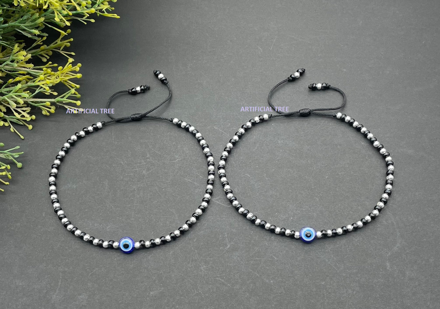 ARTIFICIAL JEWELS German Silver EVIL EYE Charms Black Thread Adjustable Nazariya Anklets | Nazar Battu | for Women and Girls (AT ANK 067)